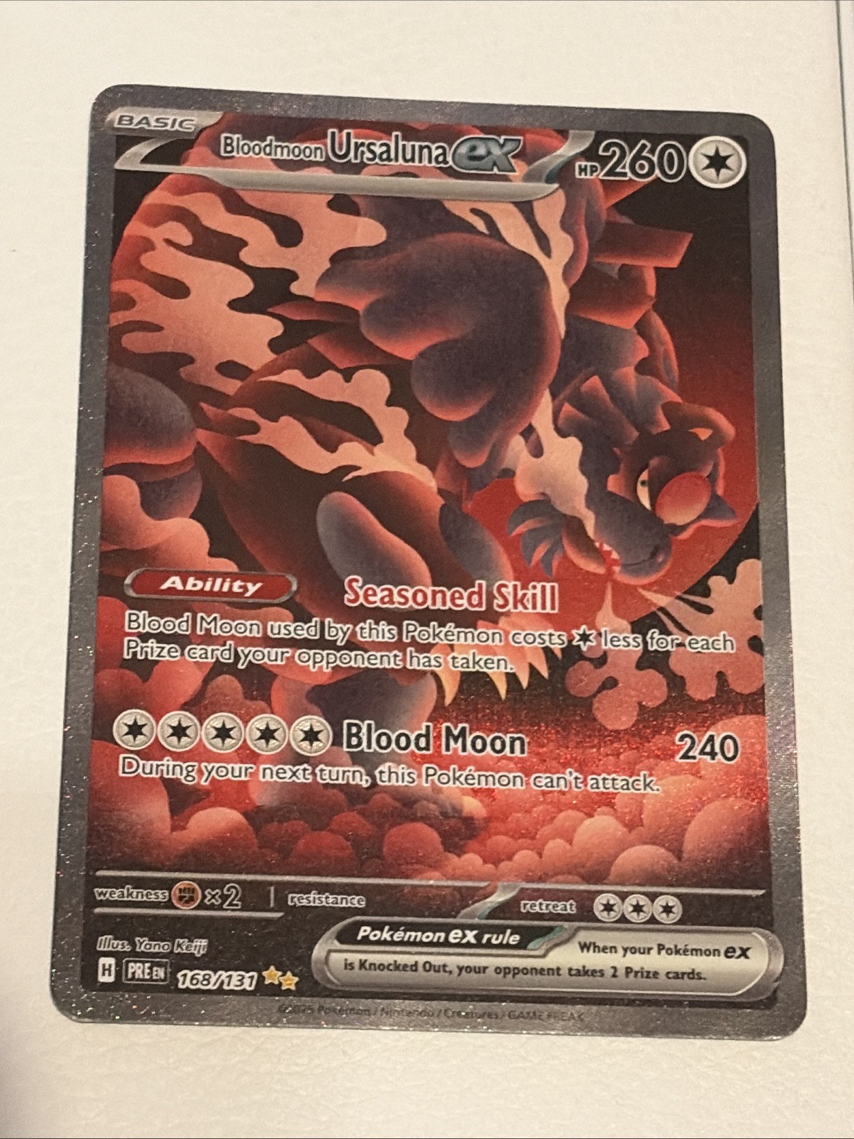 NM Ursaluna Ex 168/131 Prismatic Evolutions SIR Bloodmoon
