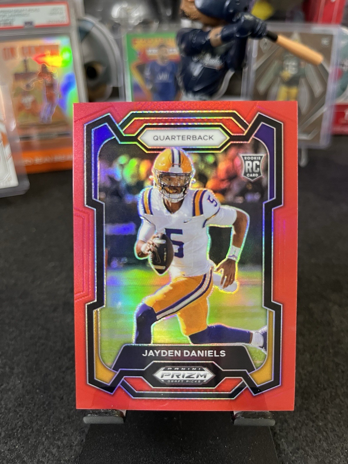 Jayden Daniels 2024 Panini Prizm Draft Picks #108 Red /299 MT Rookie RC LSU