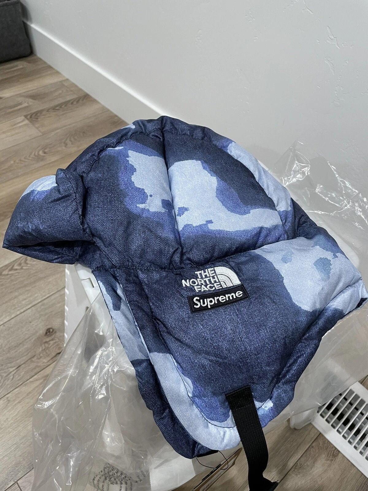 Supreme® x The North Face® denim blanchi imprimé nuptse taille L/XL FW21