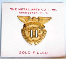 VINT ENAMELED 10KGF EMPLOYERS MUTUALS OF WAUSSAU INSURANCE 11YR SAFE DRIVING PIN