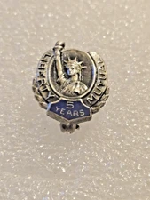 VINTAGE LIBERTY MUTUAL INSURANCE 5 YEARS AWARD LAPEL PIN.