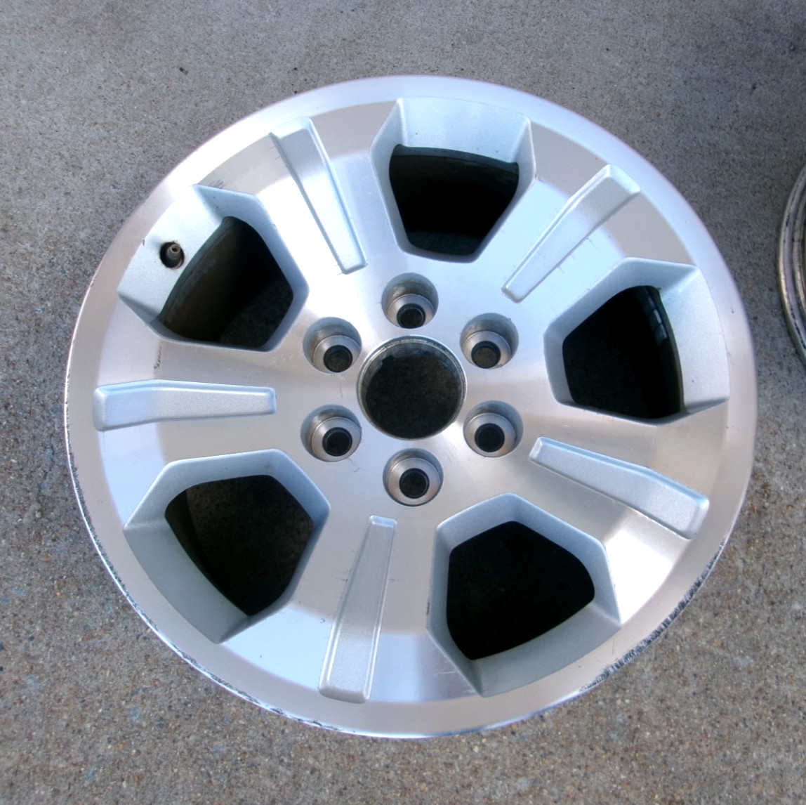 18" 2014-2019 Chevrolet Silverado Sierra Silver Pockets Machine Face Wheel Rim