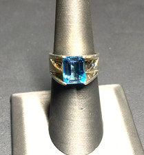925 STERLING SILVER AND EMERALD CUT BLUE TOPAZ RING SIZE 7