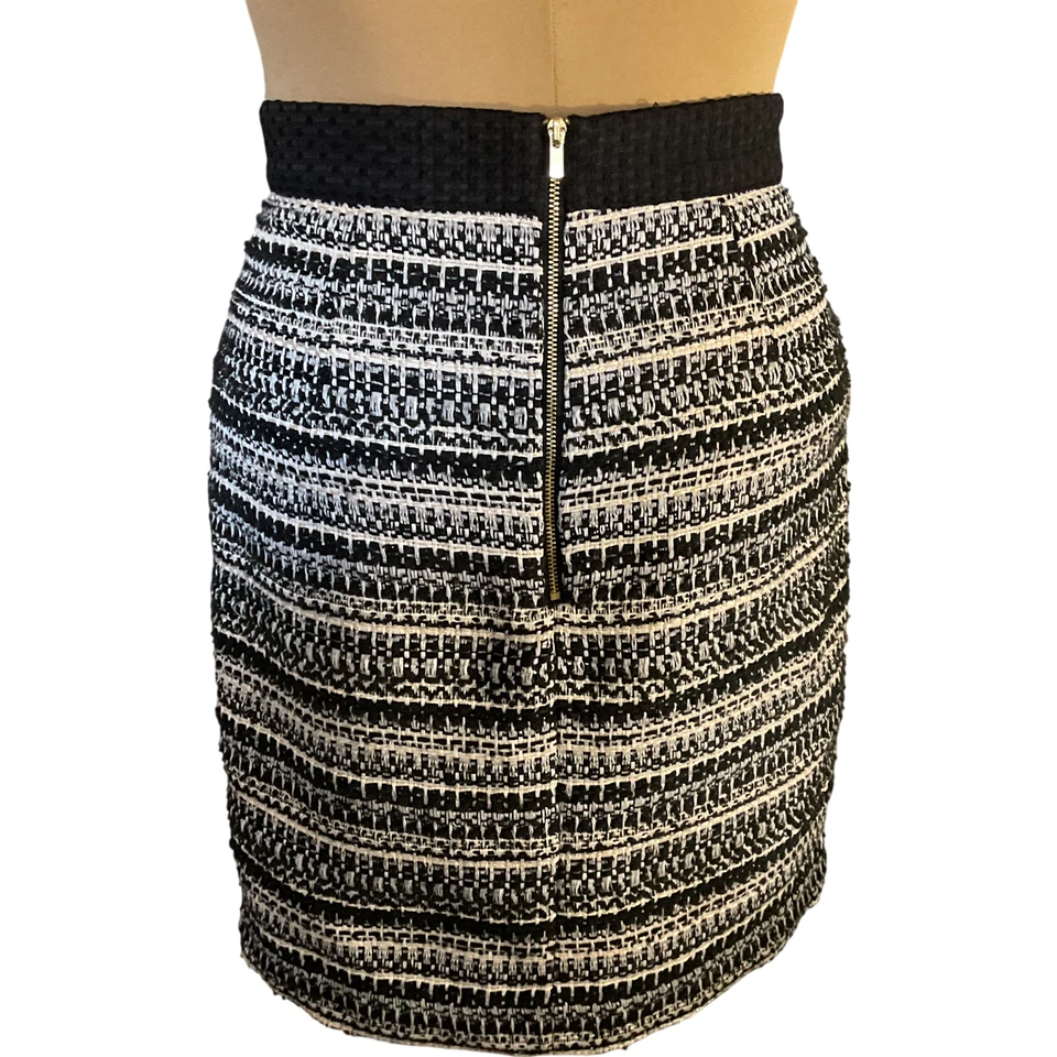 Falda para mujer H&M 10 negra blanca tweed cintura elástica cremallera trasera Foto 2 de 4