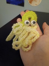 Yellow crochet octopus with Googly eyes