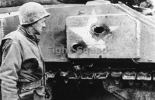 WW2 Picture Photo US soldier looks holes in the M4 Sherman tank  3787