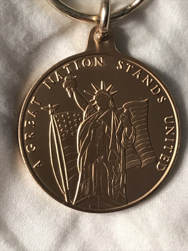 AVON "America United" 2001 Key chain. F69357-1 Firemen and Lady Liberty. NIB
