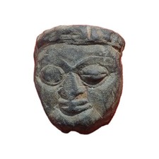 Ancient carved stone head, South American?