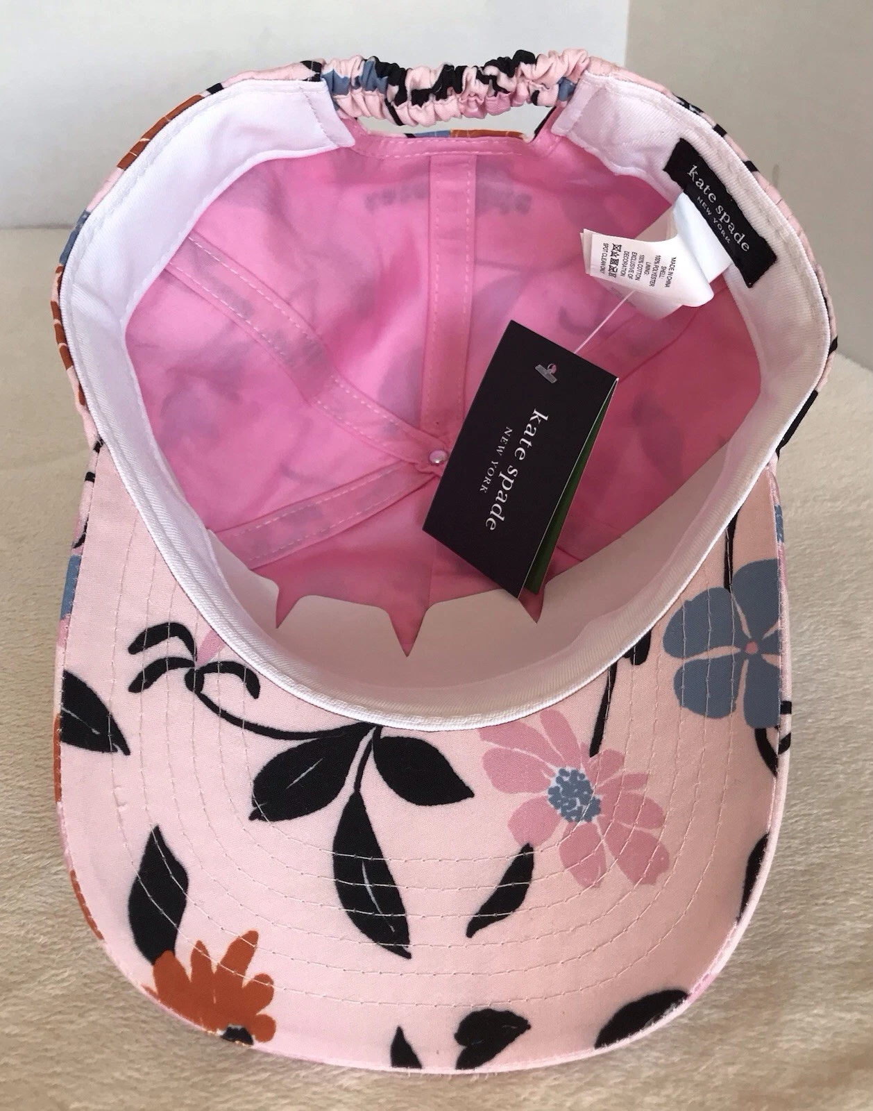 NUOVO CON ETICHETTE ~ BERRETTO DA BASEBALL KATE SPADE NEW YORK BLUSH PERLA FLOREALE CINTURINO ADJ 100% POLIESTERE