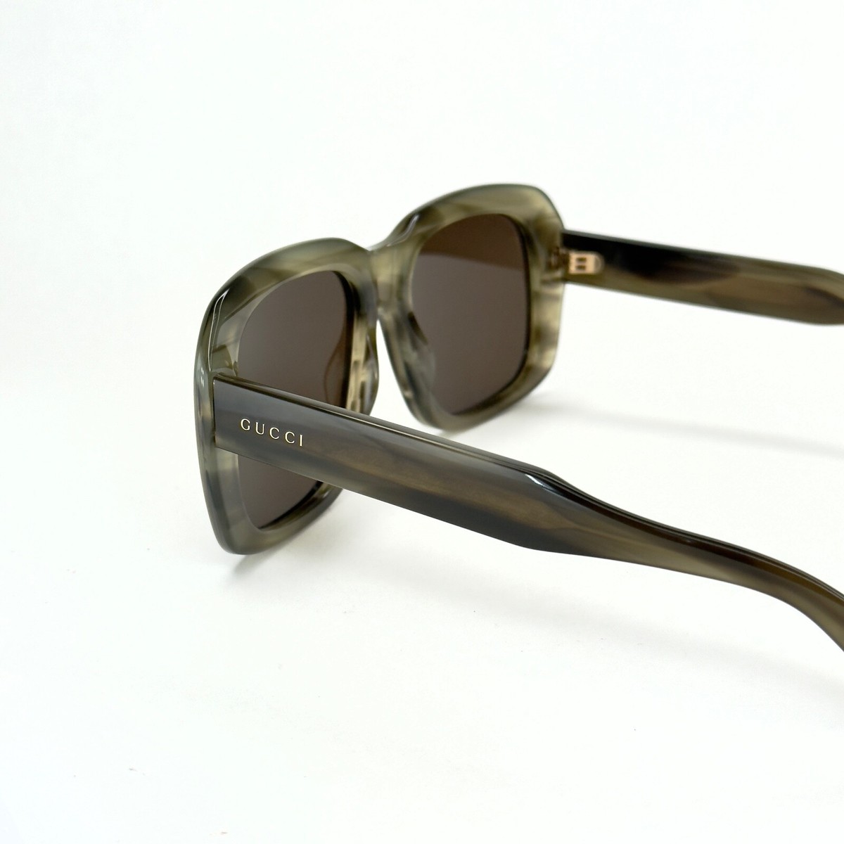 Gucci Sunglasses GG0049S 003 Striped Horn Brown Frames Brown Lenses 57-18-145 Gucci GG1189S-003 Oversized Square Brown Gradient Sunglasses  main image 2