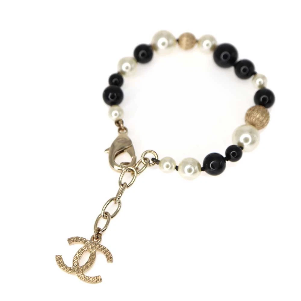 Bracciale perle Chanel 5191885 metallo con perle finte oro nero