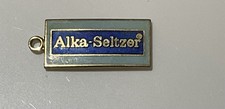 VINTAGE ALKA SELTZER CHARM WITH ENAMELING - PLOP, PLOP, FIZZ, FIZZ - ADVERTISING