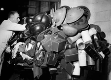 Some of thousands of gas masks helmets are piled up center of lost- Old Photo