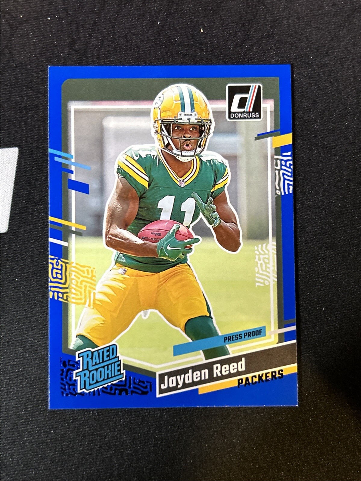2023 Panini Donruss - Rated Rookie Press Proof Blue #334 Jayden Reed (RC)Packers