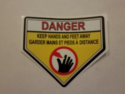 Lawn-Boy Toro Safety Danger 'Keep Hands And Feet Away' Deck Decal In French.