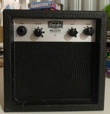 First Act Mini Portable Guitar Amplifier MA2039. Powered by x2, 9volt or AC