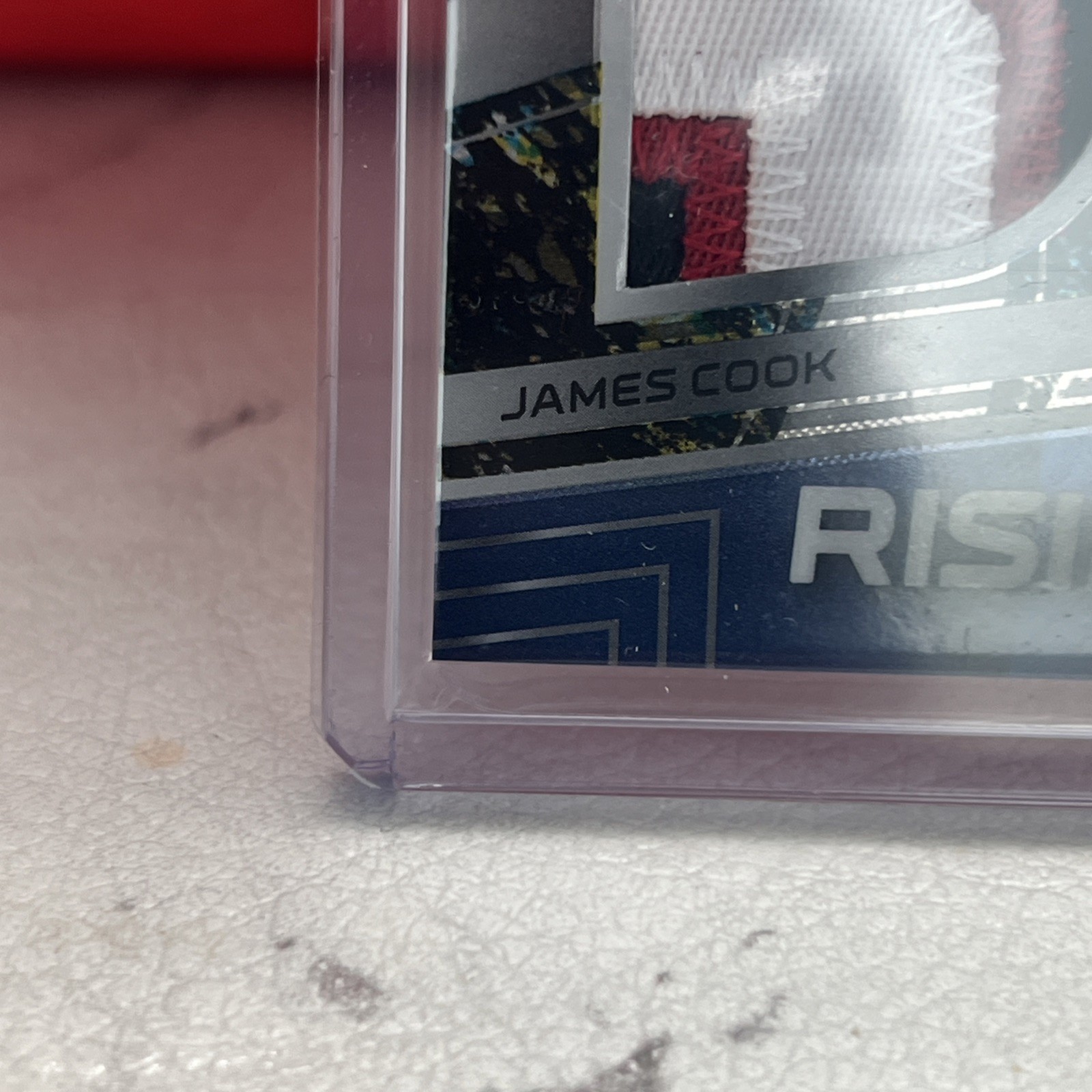 2022 Spectra James Cook Rising Rookie Dual NFL Shield Logoman Tag 1/8 view 10
