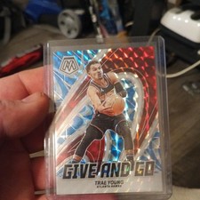 2024-25 Panini Mosaic Give and Go Reactive Blue Prizm 27/99 Trae Young #8 05ol