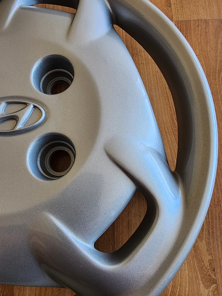 Cubierta de rueda tapacubos Hyundai Elantra 1999-2000 de fábrica de 14" #55544 plateada OEM Foto 3 de 4