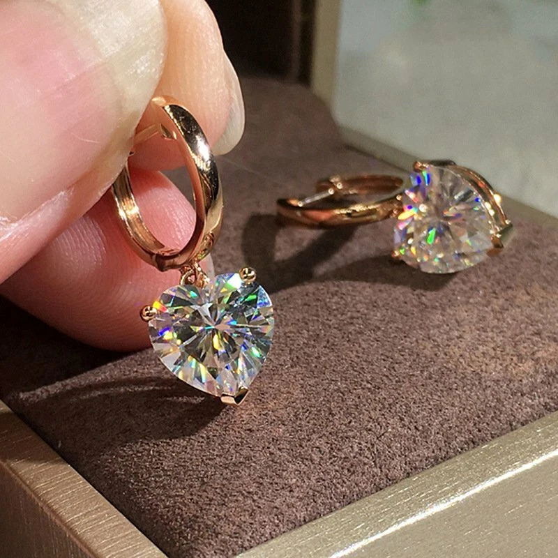 Heart shaped dangling earrings deals
