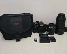 Nikon D5100 DSLR Camera Bundle 18-55mm VR 70-300mm Lenses SD Card Battery Bag