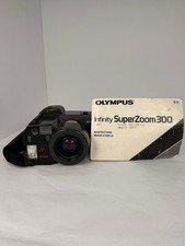 Olympus Infinity SuperZoom 300 W/Manual, Early 90s, Point And Shoot Film Camera