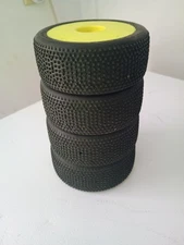 1/8 AKA Impact Medium Long Wear on Yellow WHEELS