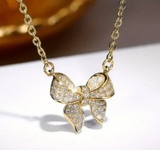 Goldene glänzende Zirkonia Schleifen Anhänger Halskette Luxus Neu