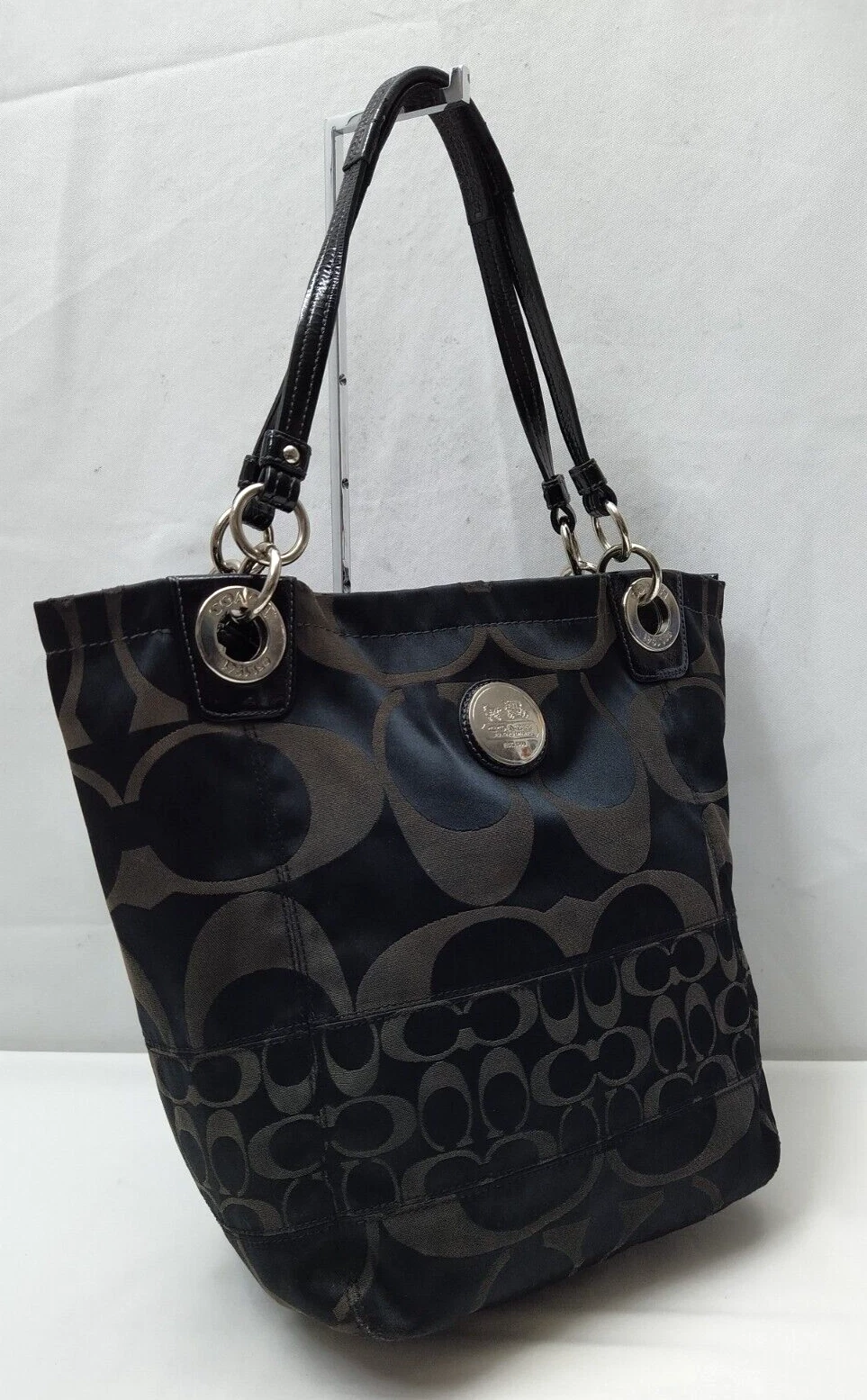 Borsa a tracolla Coach Alex Signature tela nera doppie mani con cerniera secchio tote