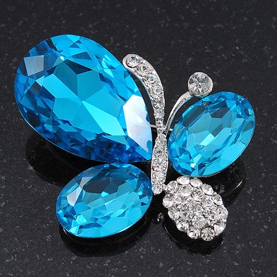 Asymmetrische Brosche ''Schmetterling'' aus aquamarinem/klarem Glas Kristall versilbert