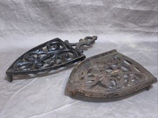 Two Vintage CAST SAD IRON TRIVETS NICE