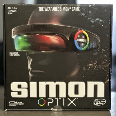 #ad Hasbro Simon Optix The Wearable Simon Game Solo Or Competition New open box $21.99