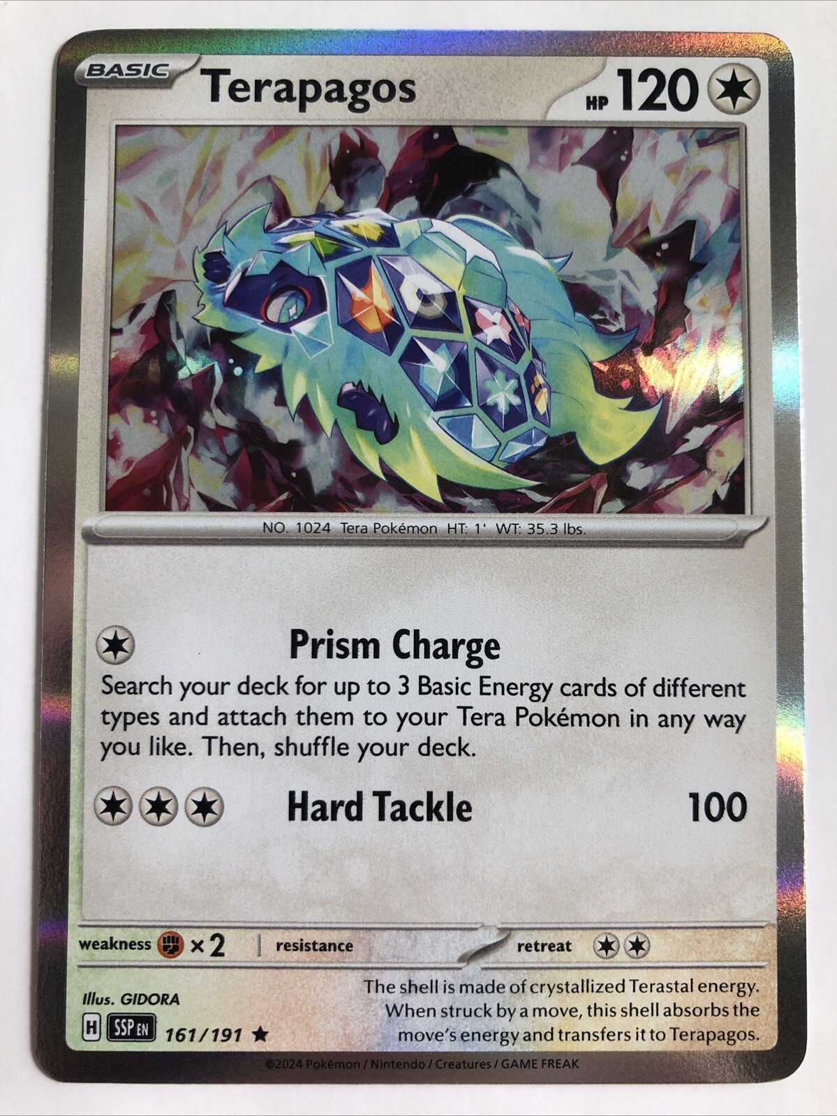 Pokémon TCG Surging Sparks Terapagos Holofoil 161/191 NM Rare