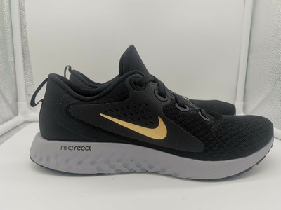 nike legend react black gold