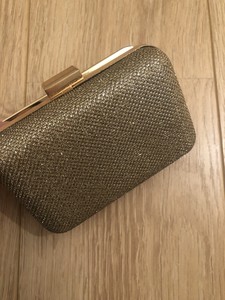 new look gold clutch