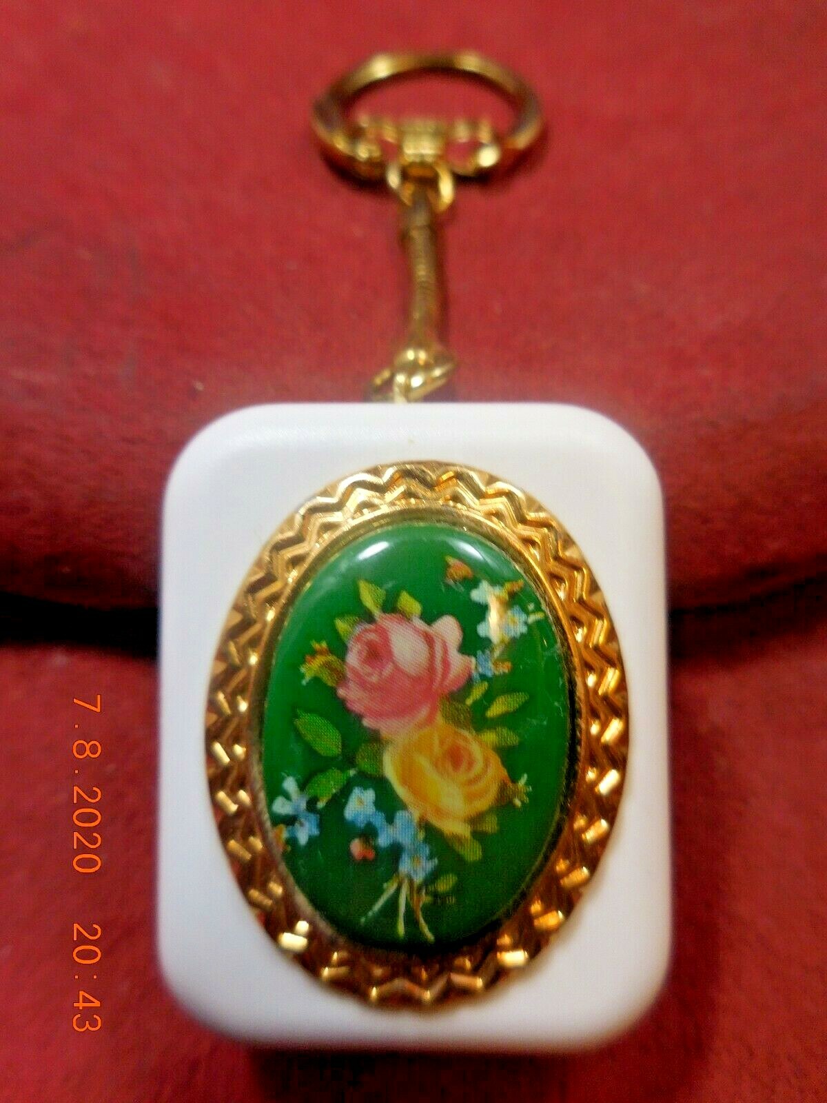 VINTAGE SANKYO MUSIC BOX KEYCHAIN ENAMEL GREEN FLORALD PLAYS "TOMORROW