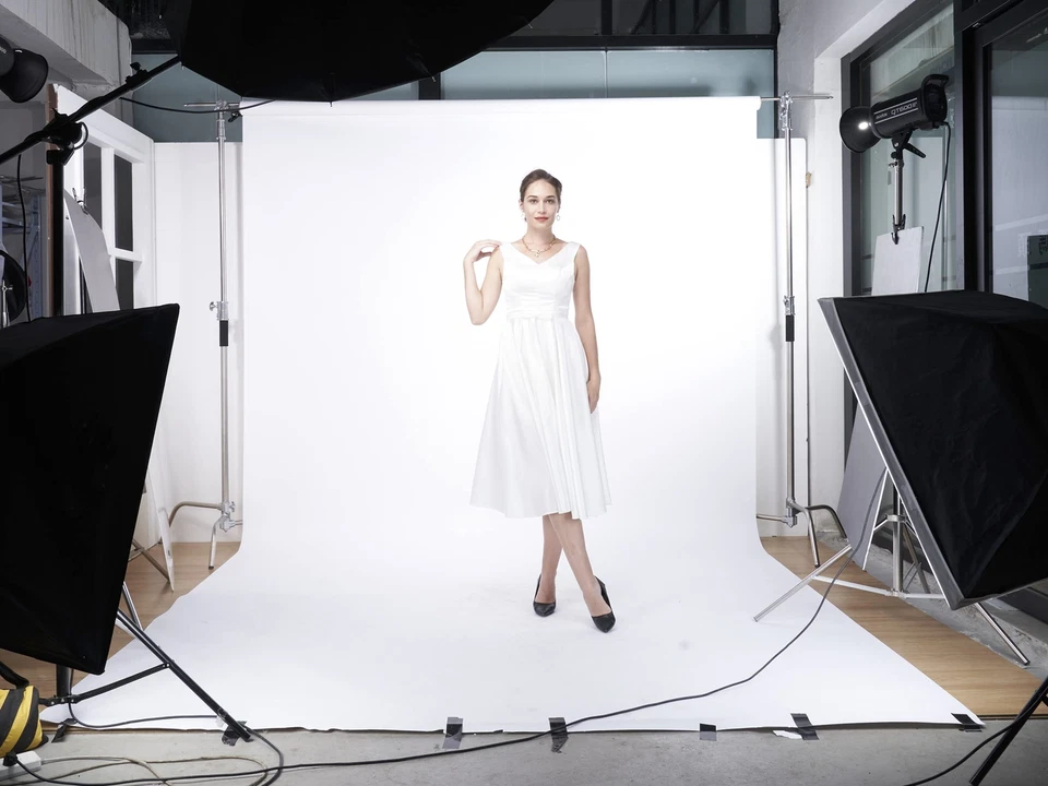 Rollo de papel de fondo de fotografía sin costuras blanco telón de fondo para fotografía... Foto 3 de 4