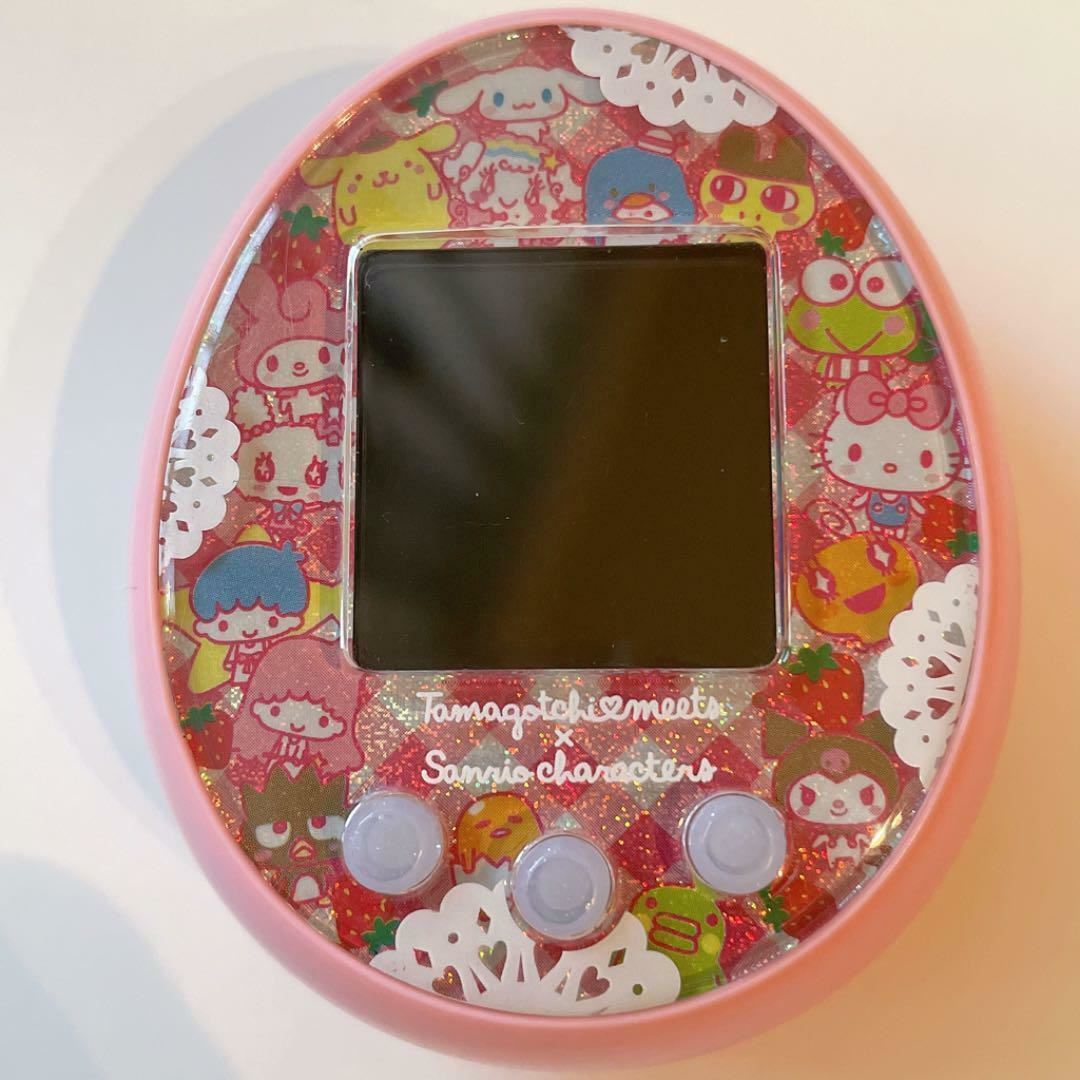 クリスマス値下中　美品 Tamagotchi Meets Sanrio ピンク s-l1200.jpg