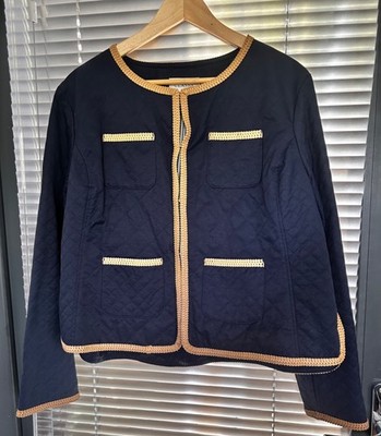 Lovely Ladies blue quilted jacket by M&S. Camel plaited edging. Dipped back. 18
