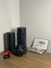 Nikon EM Camera Body W/ Nikon E 50mm f1.8, Nikon E 70-210mm f4, Vivitar 75-300mm