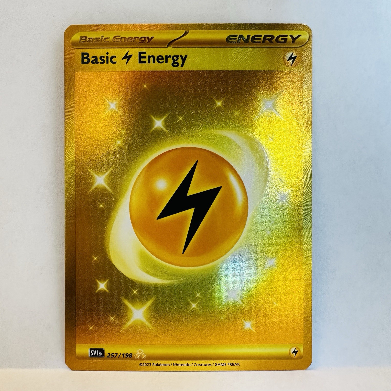 Gold Lightning Energy 257/198 Pokémon TCG Scarlet & Violet  Hyper Rare NM
