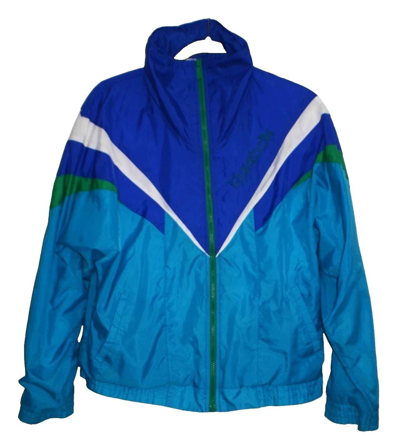 Rompevientos regular Reebok abrigos, chaquetas y chalecos para Mujeres