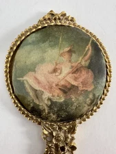 Beautiful Vintage Hand Held Gold-Toned Mirror with Victorian Themed Cloth Back