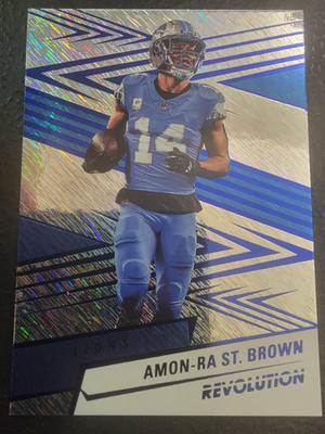 2025 Panini Revolution Amon-Ra St Brown #180 Storm /549