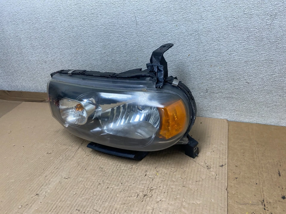 Faro lateral izquierdo halógeno Nissan Cube 2009-2011 OEM U2726 DW Foto 2 de 4