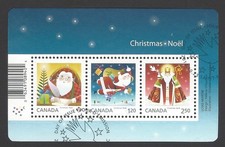 CANADA #2796, USED 2014 CHRISTMAS SOUVENIR SHEET OF 3 SANTA STAMPS