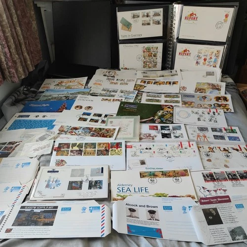 GB GUERNSEY ALBUM WITH FDC + MINT STAMPS, PRESENTATION PACKS & Covers