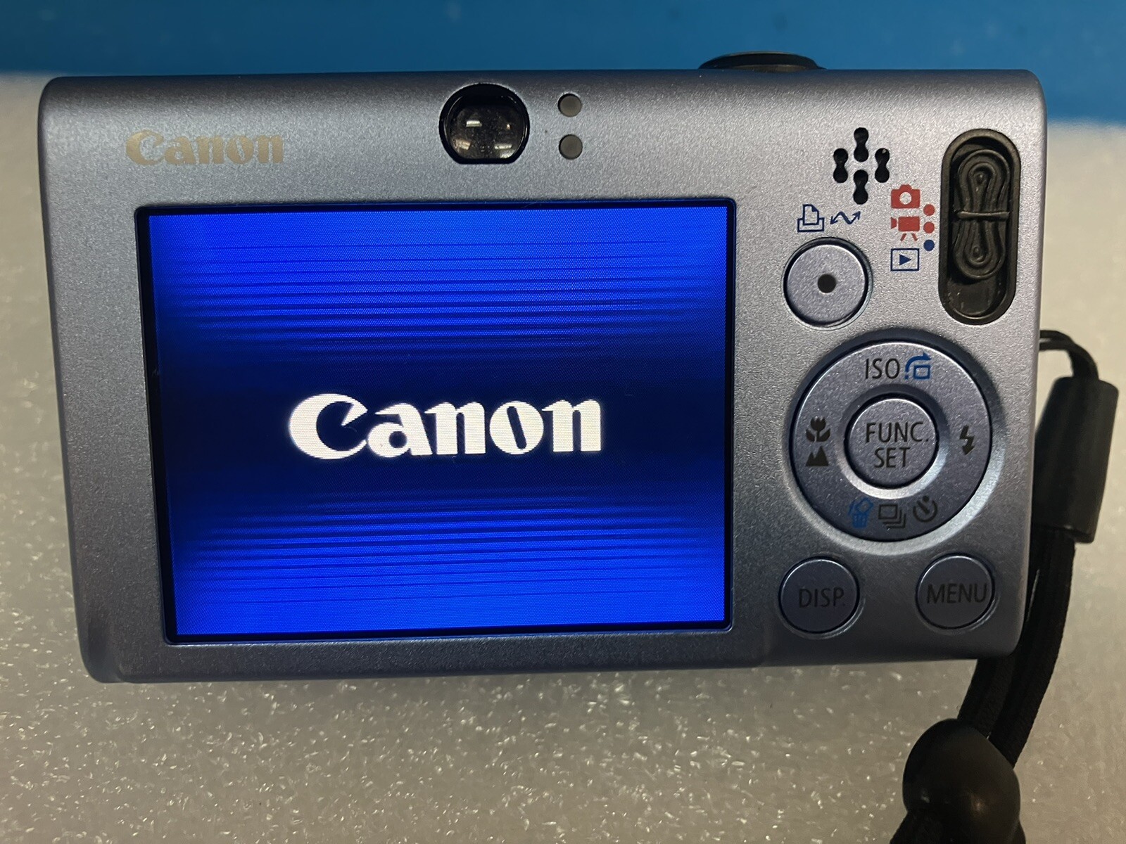  (As is) Canon PowerShot SD1100 IS 8MP Digital ELPH Camera ( LENS