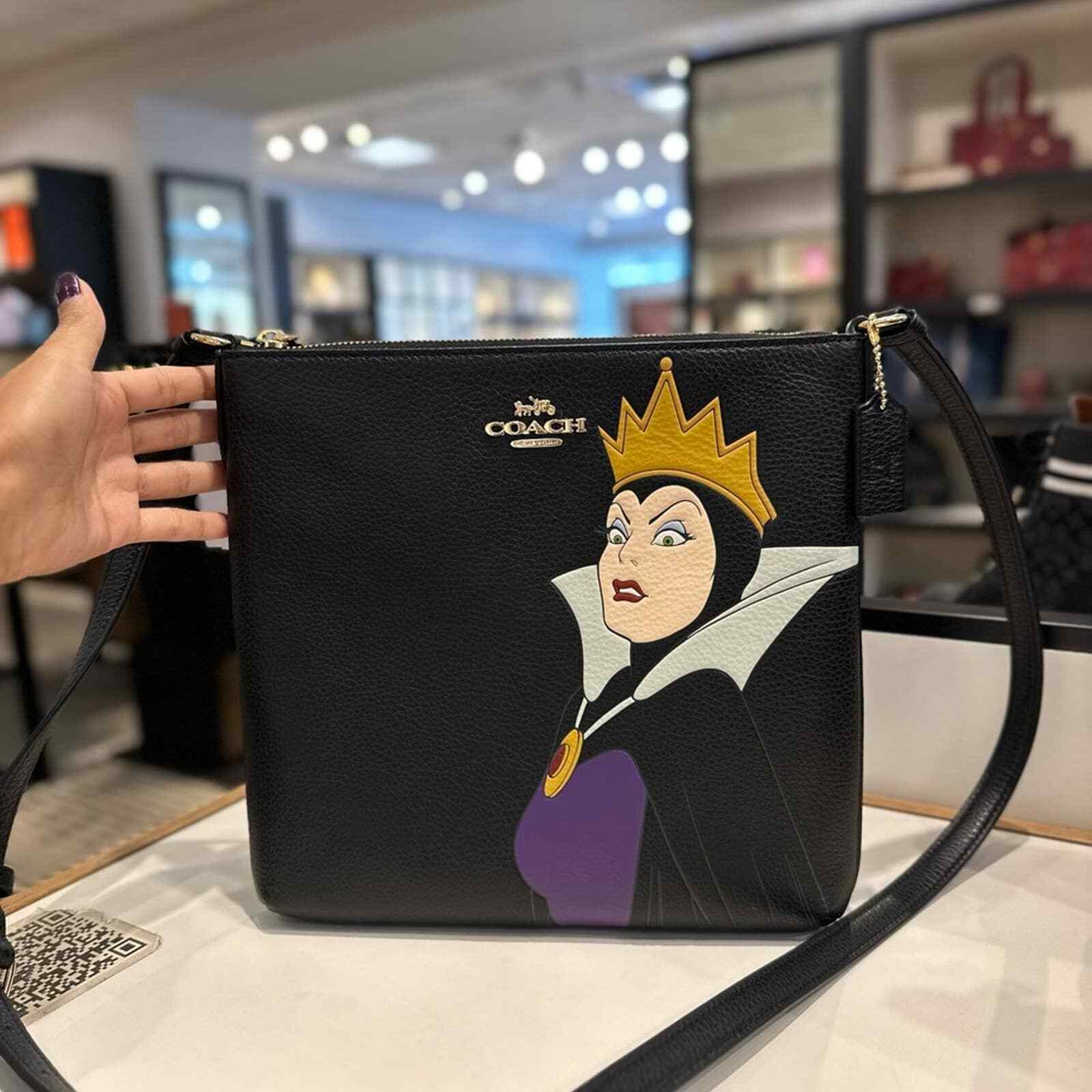 disney x coach rowan file bag with evil queen motif