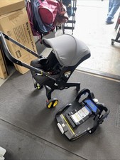 Doona Infant Car Seat Cover Black with Yellow Accents W/ Car Seat 